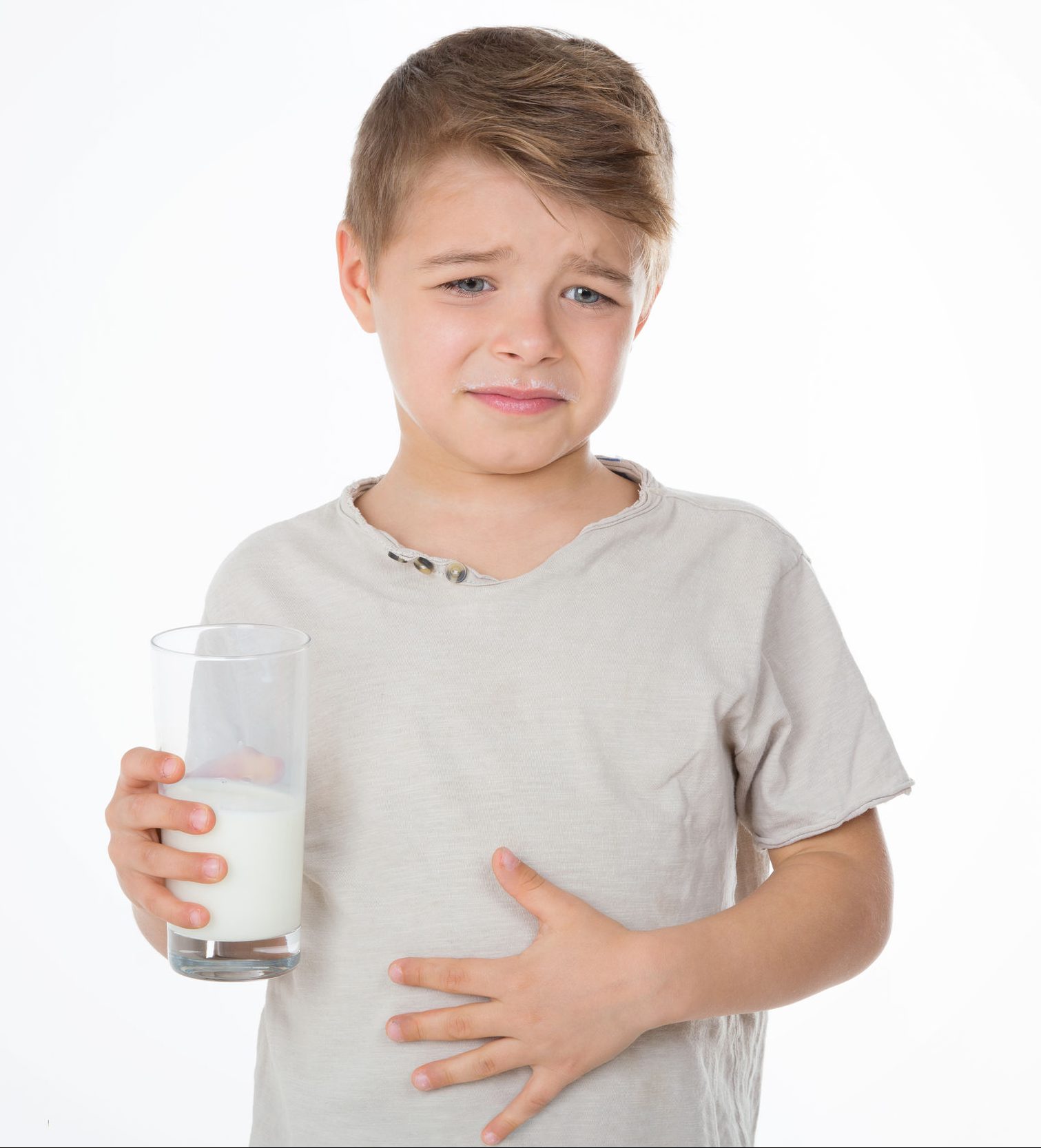 33405931 - child with painful expression after drinking milk